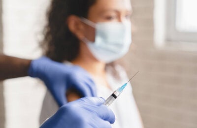 Young woman is vaccinated